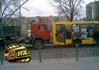 Киев. КамАЗ припечатал маршрутку с пассажирами. Фото