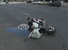 Киев. Мотоциклист, пытаясь выпендриться, летел с железного коня дальше, чем видел. Фото