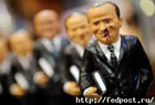 Бизнес на крови. В Италии продают статуэтки окровавленного Берлускони. Фото