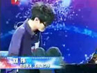 Безрукий пианист, играющий на фортепьяно пальцами ног, победил в телешоу «Китай ищет таланты»