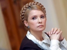 Тимошенко, поздравляя женщин, ныла о «хрупких плечах» и не оправдавших надежд мужчинах