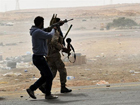Война в Ливии. Повстанцы отбили стратегически важный город у Муаммара Каддафи