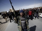 Обама взял под крыло ливийских повстанцев. Оружие не купит, но денег даст