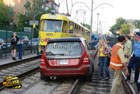 В Киеве «самурай» на Subaru, протаранив Peugeot, вылетел на трамвайную колею. Фото