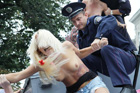 Как полуголые активистки FEMEN митинговали на крыше автоказа Тимошенко. Фото
