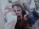 Опубликован снимок окровавленного Каддафи. Возможно, это его последние минуты жизни. Фото