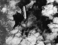 Затонувший лайнер «Коста Конкордиа» сфотографировали из космоса. Фото