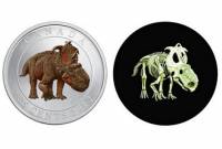 Канадцы отчеканили оригинальную монету с динозавром, которая светится в темноте