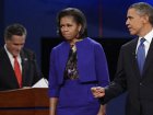 В ходе дебатов в США кандидаты улыбались друг другу, а жена Обамы кривлялась