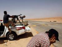 Вооруженные отряды осадили город сторонников Каддафи