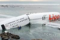 Фоторепортаж с места падения авиалайнера Boeing 737 900 ER вблизи Бали