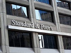 Standart & Poor's осторожно понизило рейтинги крупнейших мировых банков