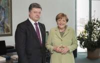 Меркель приняла Порошенко и сказала, что готова помочь