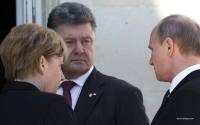 Президент Франции утверждает, что Порошенко и Путин пожали руки и провели 15-минутную встречу /обновлено/