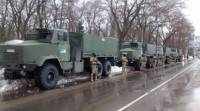 На улицах Одессы появились военные грузовики и люди с автоматами