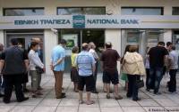 Греческие банкоматы остановят выдачу купюр вечером 13 июля