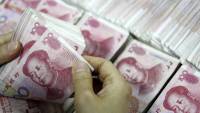 Китай девальвировал юань на рекордную за 20 лет величину