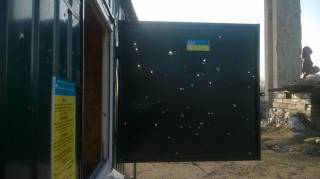 В Сети появились фото результатов обстрела боевиками вагончика ГФС на Луганщине