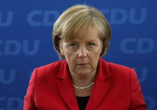 Меркель настаивает на сохранении санкций против России