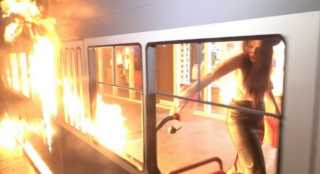 Феминистки устроили очередной пожар возле магазина «Roshen». На этот раз в Виннице