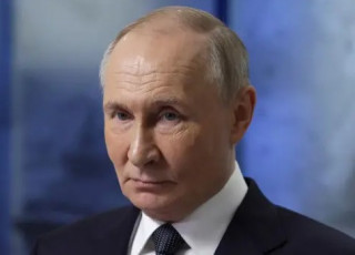 Напередодні польоту на Аляску Путін про щось пожартував зі своїм найближчим оточенням